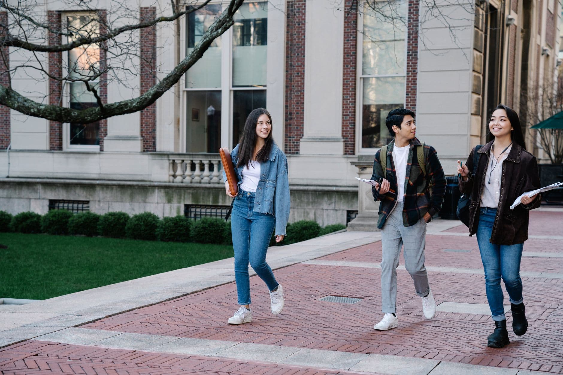 University students walking across a medical campus
